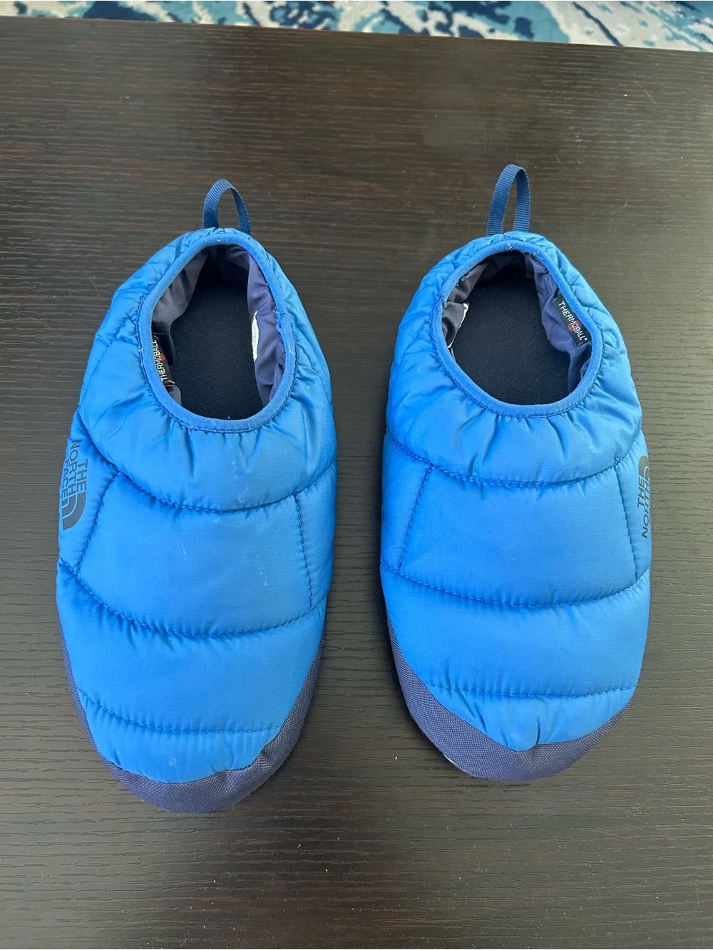 The North Face men’s ThermoShoes - Blue Cozy Slip-Ons